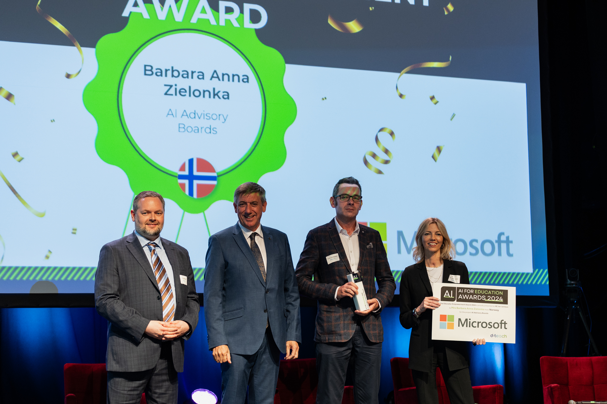 Award recipients and guests presenting a trophy and certificate at the AI for Education Awards in Oslo in 2024